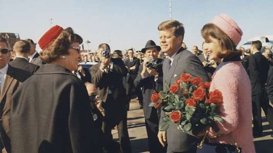 JFK Revisited: Through The Looking Glass - Backdrop