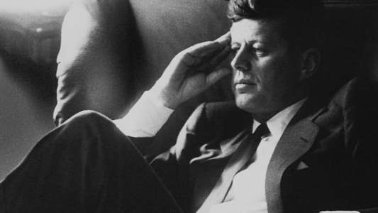 JFK Revisited: Through The Looking Glass - Backdrop