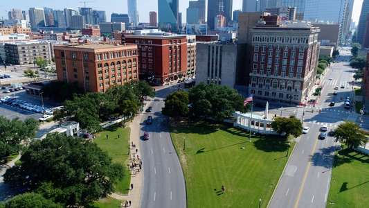 JFK Revisited: Through The Looking Glass - Backdrop
