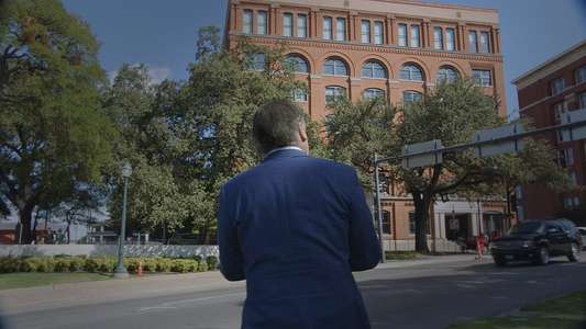 JFK Revisited: Through The Looking Glass - Backdrop
