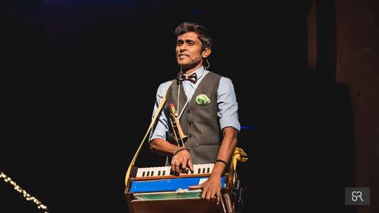 Alexander Babu: Alex in Wonderland - Backdrop