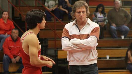 American Wrestler: The Wizard - Backdrop