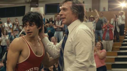 American Wrestler: The Wizard - Backdrop