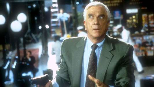 Naked Gun 33⅓: The Final Insult - Backdrop