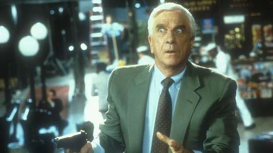 Naked Gun 33⅓: The Final Insult - Backdrop