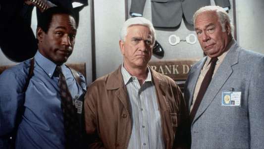 Naked Gun 33⅓: The Final Insult - Backdrop