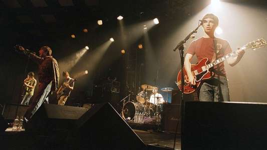 Oasis: 10 Years of Noise and Confusion - Backdrop