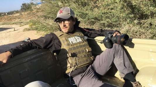 Armed Only with a Camera: The Life and Death of Brent Renaud - Backdrops