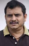 Ezhil 