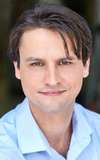 Adam D. Crain